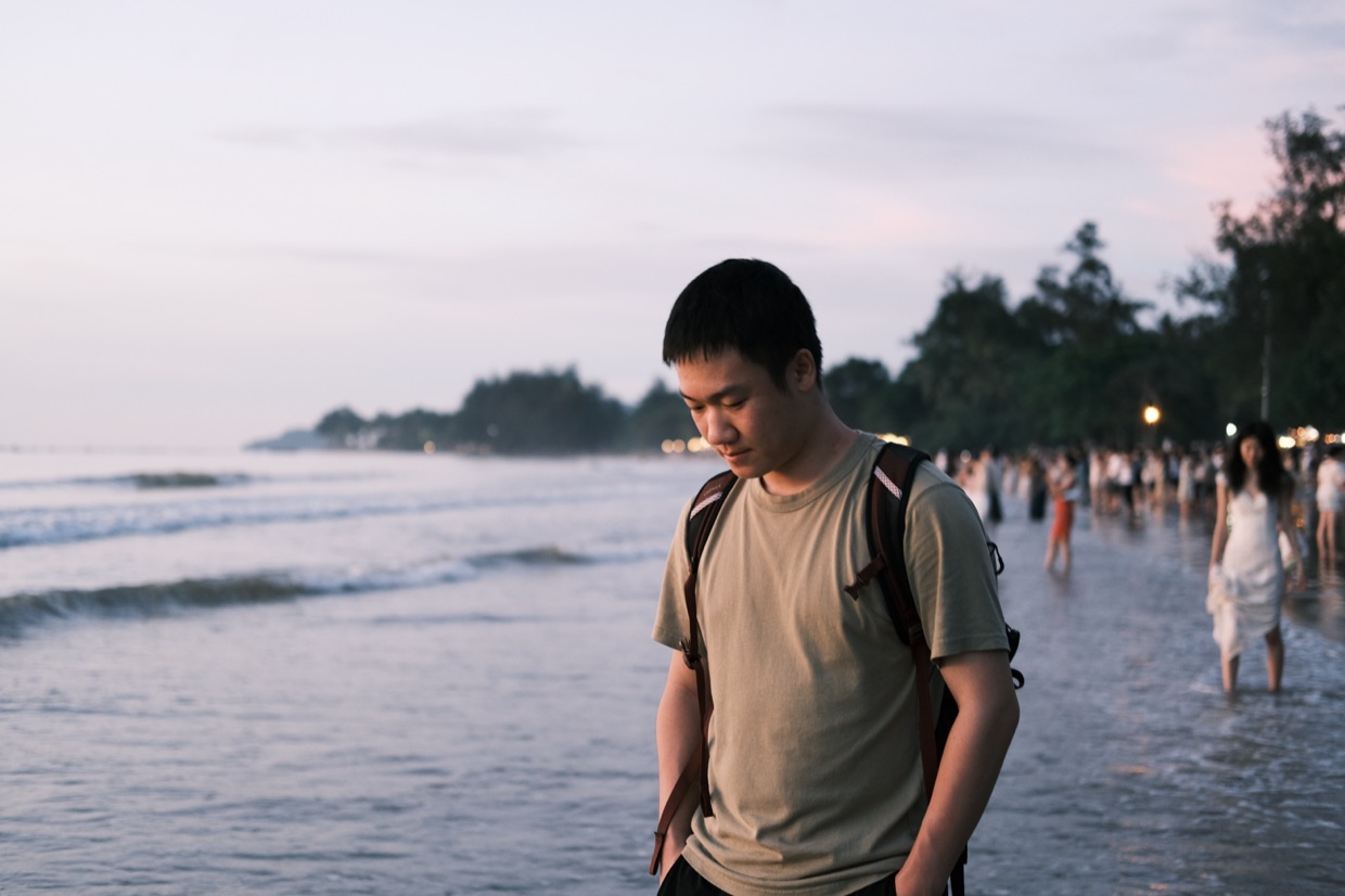 Yingjia Wang standing by the sea